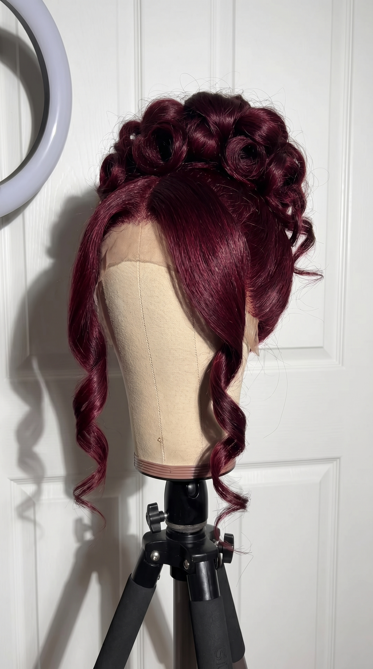 Loose curl burgundy human hair lace wig from Celebrity Hair & Beauty featuring 360 lace design and natural-looking curls.