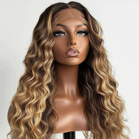 Blonde Indian lace wig with deep loose waves, 24 inches, HD lace, pre-plucked, 180% density, from Celebrity Hair & Beauty extensions.