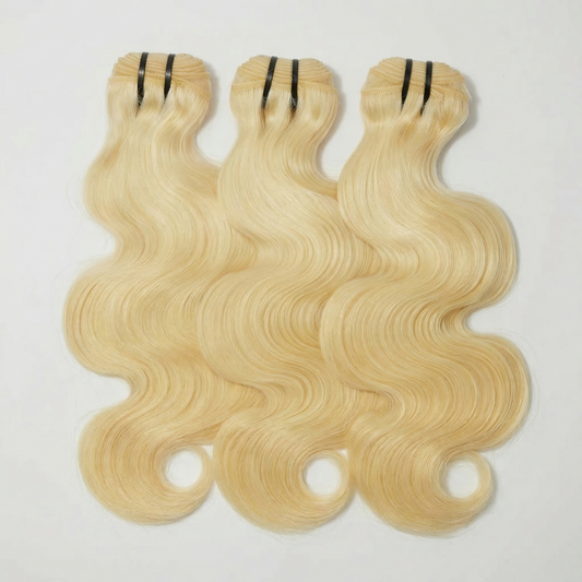Three 613 blonde raw Indian hair bundles, body wave, 8-40 inches, double drawn.