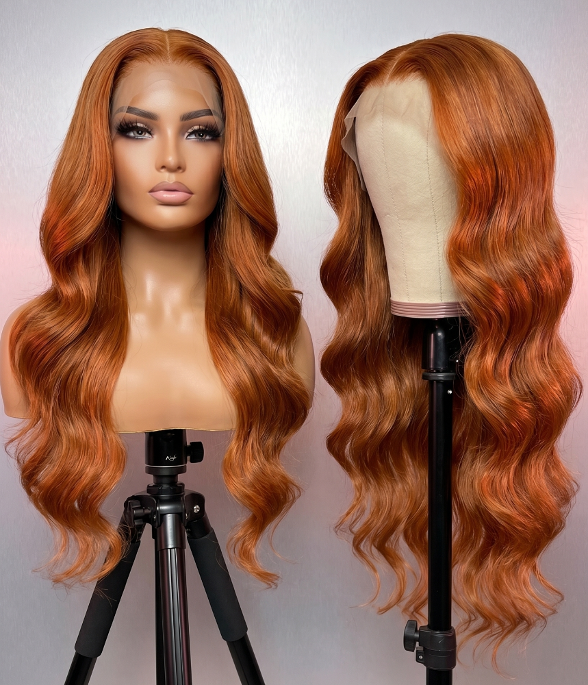 Celebrity Hair & Beauty body wave wig with 13x6 HD lace, orange/ginger color, 210% density extensions on a mannequin head.