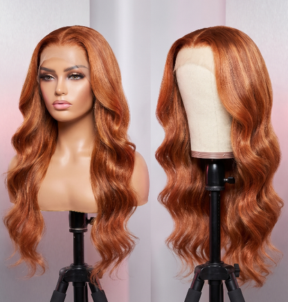 Celebrity Hair & Beauty body wave wig with 13x6 HD lace, orange ginger color, 210% density extensions showing the textured waves.