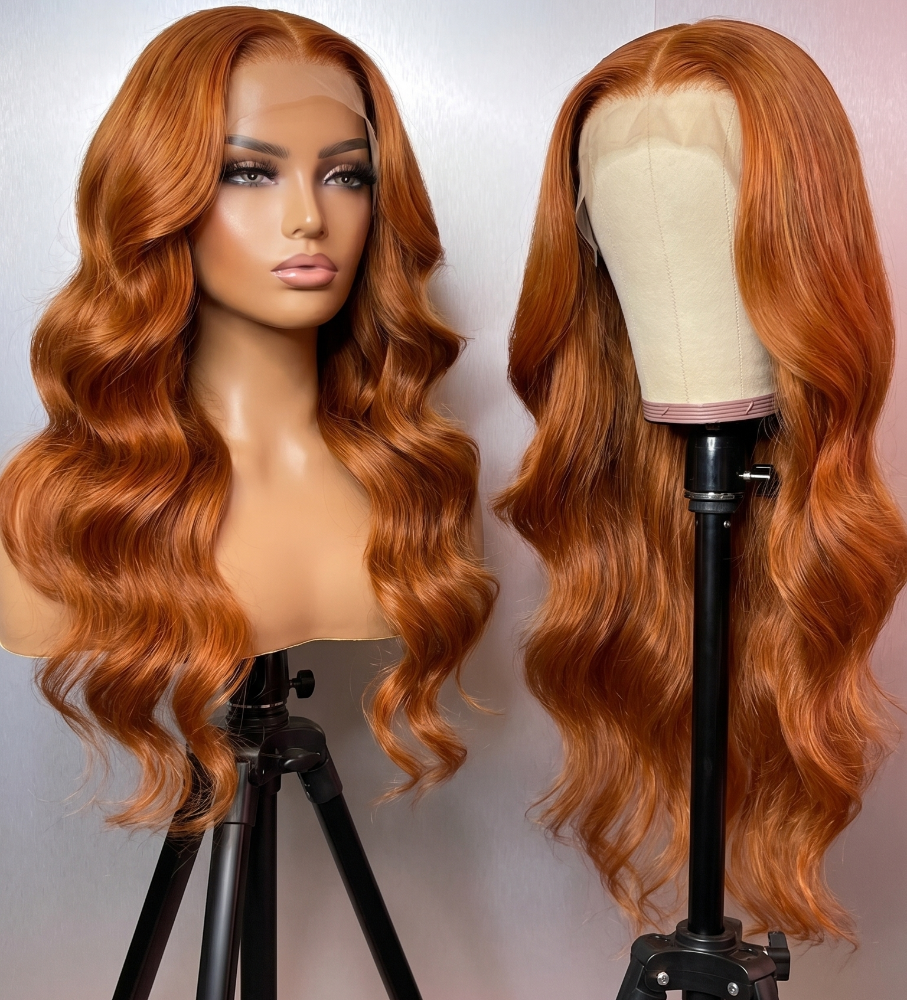 Celebrity Hair & Beauty body wave wig with 210% density, 13x6 HD frontal lace, in orange/ginger color, extensions visible in the image.