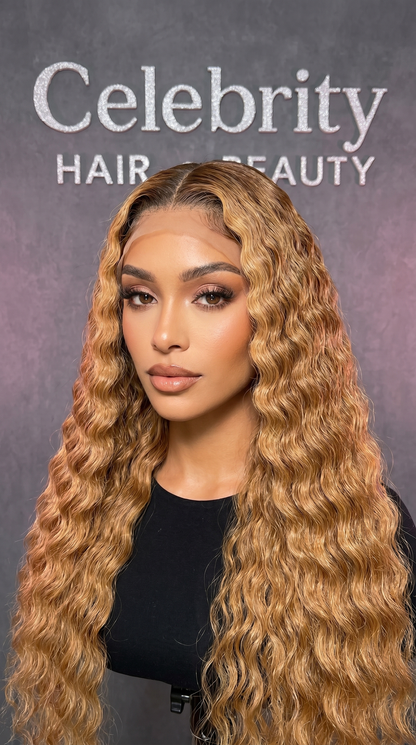 Celebrity Hair & Beauty Deep Wave Lace Front Wig with pre-plucked Brazilian Remy human hair, showcasing the textured curly extensions.