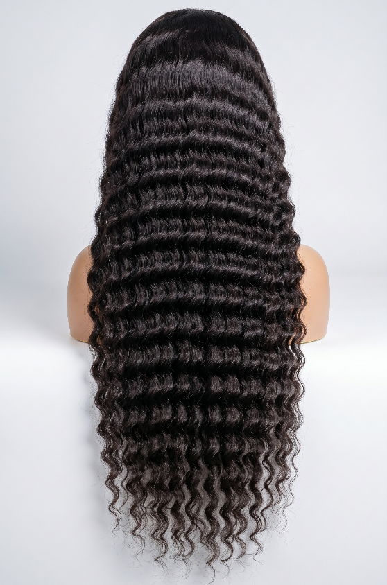 Deep Wave Cambodian virgin human hair wig with transparent lace, 13x4 frontal, styled with soft deep wave texture.