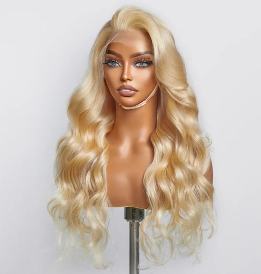 Blonde 613 body-wave lace frontal wig, 150% density, 13x4 frontal, 16–30 inches, transparent lace