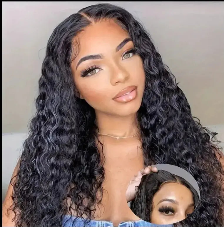 Woman with long 13x6 wave glueless 200% density human hair wig and natural lace front.