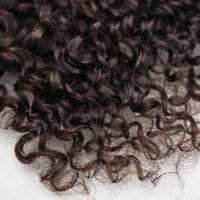 Miracle Knots human feather crochet hair by Celebrity Hair & Beauty with Burmese curly texture and no spiral ends.