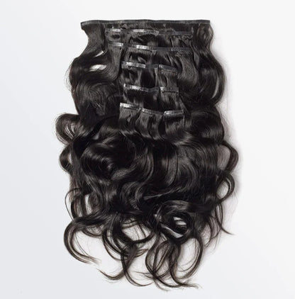 Celebrity Hair & Beauty 18-22 inch body wave seamless clip-in hair extensions displayed in natural light, showing the wavy texture and clips.